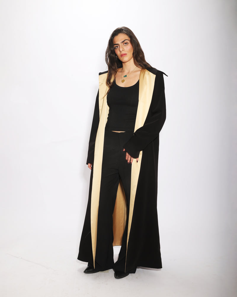 The Onyx Coat, black coat with gold satin lining